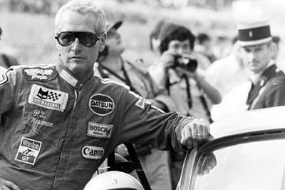 Paul Newman pictured racing his 240Z